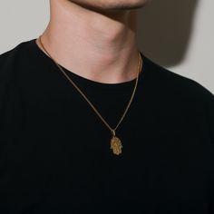 Our Gold Hamsa Pendant is made from Premium quality 316L stainless steel. This allows the pendant and chain to be water and sweat resistant. This chain can be worn on its own as a statement or be layered with other chains from our shop.◈ Chain Length: 20.8 Inches◈ Chain Width: 2.2 MM◈ Chain Style: Curb chain◈ Pendant Size: 25mm x 17mm x 1.9mm◈ Chain Quality: 316L stainless steel with PVD vacuum 18K gold plating◈ Chain Clasp: Lobster◈ Model is male, 5'10 & size medium◈ Hypoallergenic, water and s Stainless Steel Large Pendant Necklaces, Spiritual Stainless Steel Chain Necklace, Sterling Silver Pendant Necklace For Streetwear, Gift Stainless Steel Rope Chain Necklace, Stainless Steel Rope Chain Necklace Gift, Streetwear Pendant Necklace With Chain, Spiritual Stainless Steel Pendant Charm Necklace, Everyday Stainless Steel Pendant Charm Necklace, Gold Necklace With Adjustable Chain For Streetwear