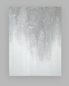 an abstract painting with white and grey colors on the wall, it looks like snow is falling