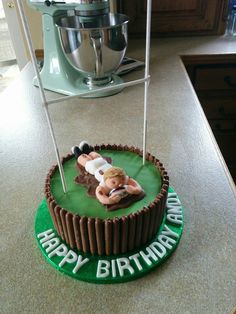 a birthday cake that is on top of a counter