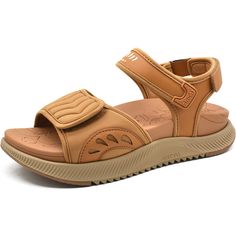 a tan sandal with two straps and an open toe