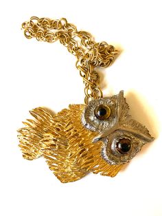 "This is a wonderful MASSIVE artist crafted Owl necklace with a chunky gold tone chain. This necklace is one of a kind and I have never seen anything like it before. The ultimate statement piece with stunning texture and glass eyes. This beauty looks wonderful with any outfit. Whoots the stylish dresser? You are! Measurements: 4\" tall, 2 1/2\" wide with a 18\" long chain -------------------------------------------------------------------- ★ THANK YOU FOR VISITING MY SHOP ★ For as long as I can Vintage Handmade Gold-tone Jewelry, Vintage Gold Chain Necklace Nickel Free, Handmade Vintage Gold-tone Jewelry, Unique Gold Chain Necklace, Handmade Pendant Chain Necklace In Costume Jewelry Style, Vintage Handmade Metal Chain Necklace, Unique Metal Chain Necklace, Handmade Gold-tone Metal Necklaces, Bohemian Gold Hand Cast Necklace