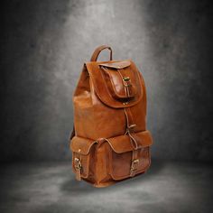 Leather Backpack Men's Leather Travel Bag, Brown Leather Backpack, Leather Rucksack Bag, Travelers Hiking Backpack, Fathers Day Gift Each vintage leather bag is a totally natural and handmade product therefore . So there may be some variation in color and the textures to the different parts of a bag, which will create a wonderfully unique effect. *Size:- ( SMALL ) Height: 16 Inches; Width: 8 Inches; Depth: 8 Inches ( MEDIUM ) Height: 18 Inches; Width: 8 Inches; Depth: 8 Inches (LARGE ) Height: 2 Leather Backpack For Trip, Large Capacity Brown Leather Backpack For Adventure, Brown Large Capacity Leather Backpack For Adventure, Large Capacity Leather Bags For Adventure, Leather Backpack For Men, Rucksack Bag, Brown Leather Backpack, Leather Rucksack, Leather Travel Bag