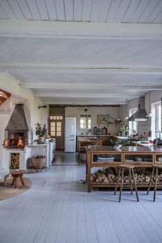 the kitchen is clean and ready to be used as a living room or dining area