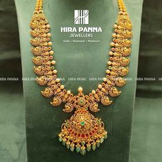 Antique Mango Lakshmi & Peacock Nakshi Haram in 2022 | Bridal gold jewellery designs, Gold wedding jewelry necklace, Gold jewelry earrings Mini Haram Gold Designs, Mango Mala Jewellery, Mini Haram, Mala Designs, Gold Haram Designs, Mango Mala, Baby Jewellery, Haram Designs, Gold Haram