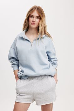 CLASSIC FLEECE OVERSIZED HALF ZIP SWEATSHIRT Oversized Half-zip Tops For Spring, Casual Half-zip Loungewear Top, Casual Loungewear Half-zip Top, Oversized Half-zip Spring Tops, Oversized Half-zip Top, Trendy Cotton Half-zip Sweatshirt, Blue Half-zip Top For Loungewear, Oversized Half-zip Sweatshirt For Sports, Oversized Half-zip Athleisure Top