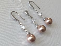 Wedding Rose Gold Small Pearl Drop Silver Earrings and Necklace Bridal Dainty Jewelry Set with .925 Sterling Silver Chain. EARRINGS are about 1.29 inch (3.3cm) long from top of earring wire to bottom. CHAIN is 18 inches (45.7 cm) long. PENDANT is about 1.25 inch (2.8cm) long including bail. BRIDAL EARRINGS SECTION: https://www.etsy.com/shop/LanaChayka?ref=seller-platform-mcnav§ion_id=11638940 BRIDAL JEWELRY SETS SECTION: https://www.etsy.com/shop/LanaChayka?ref=seller-platform-mcnav§ion_id=25839 Rose Gold Sterling Silver Jewelry Sets For Wedding, Rose Gold Sterling Silver Wedding Jewelry Sets, Pearl Earrings And Necklace, Bridal Jewelry Pearl Sets, Bridal Necklaces, Wedding Rose Gold, Rose Gold Wedding Jewelry, Gold Pearl Jewelry, Dainty Wedding