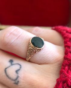 12K rose gold vintage bloodstone carved signet ring. Size 5.25 Gem Steady estate jewelry is sold as-is.  If you are not satisfied with your purchase please message us immediately. Your Gem Steady estate purchase may be returned or exchanged minus shipping costs within 7 days of delivery. Victorian Signet Ring, Victorian Gemstone Signet Ring For Formal Occasions, Victorian Gemstone Signet Ring For Formal Events, Streetstyle Hairstyle, Vintage Black Gemstone Signet Ring, Gothic Signet Ring, Bloodstone Signet Ring, Bloodstone Ring, Bloodstone Jewelry