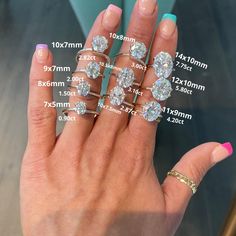 a woman's hand with five different rings on it and the measurements for each ring