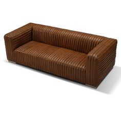 a brown leather couch sitting on top of a white floor