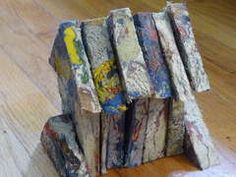 a pile of books sitting on top of a wooden floor