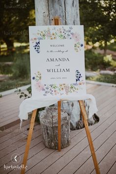 an easel with a sign on it that says welcome to amanda and willama