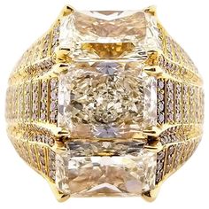 Natural Yellow Radiant Cut Diamond Ring | From a unique collection of vintage Fashion Rings at https://www.1stdibs.com/jewelry/rings/fashion-rings/. Luxury Gold Diamond Ring With Single Cut Diamonds, Luxury Yellow Diamond Ring, Luxury Yellow Gold Diamond Ring With Baguette Cut, Luxury Yellow Gold Diamond Ring Baguette Cut, Luxury Yellow Gold Baguette Cut Diamond Ring, Luxury Gold Diamond Ring For Formal Occasions, Luxury Yellow Baguette Cut Ring, Luxury Gold Diamond Ring With Diamond Accents, Luxury Gold Rings With Single Cut Diamonds