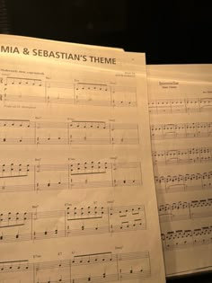 sheet music is displayed on top of each other in front of a black background with the words mia and sebastian's theme