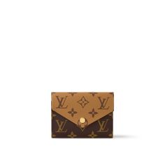 LOUIS VUITTON® - Victorine Wallet - Monogram Monogram Reverse Luxury Wallet In Monogram Canvas, Luxury Monogram Canvas Wallet With Card Slots, Brown Monogram Canvas Bifold Wallet, Classic Wallet In Monogram Canvas With Original Box, Luxury Brown Wallets With Logo, Classic Monogram Canvas Wallet, Reverse Canvas, Louis Vuitton Official Website, Luxury Wallet