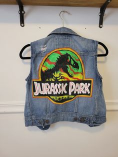 Hand painted Fandom denim vest with Jurassic Park logo. Ford color scheme vest in xs small. Jurassic Park Logo, Jeans West, Womens Jackets, Upcycled Denim, Jurassic Park, Denim Vest, Color Scheme, Selling On Etsy, Color Schemes