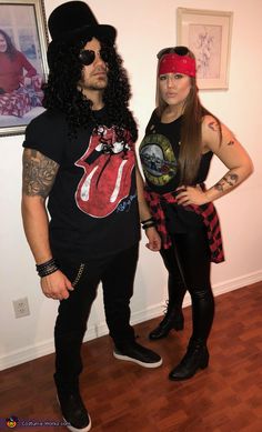 two people dressed up in costumes standing next to each other