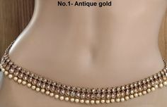 * Beautifully designed dark gold color belly chain. * can be used with belly dance costumes and saris. * no.1- Gold Belly chain high quality                Adjustable from 27 to 39 inches Waist.  no.2- Gold Belly chain high quality                Adjustable from 27 to 39 inches Waist.  no.3- Gold Belly chain high quality                Adjustable from 27 to 39 inches Waist. Gold Waist Chain With Beads As Gift, Bohemian Gold Waist Chain As Gift, Bohemian Gold Waist Chain For Festivals, Elegant Gold Beaded Waist Chain, Elegant Gold Waist Chain For Festive Occasions, Gold Bohemian Kundan Necklace With Stone Work, Gold Kundan Jewelry For Festival, Bohemian Gold Kundan Necklace With Stone Work, Gold Kundan Necklace For Festival