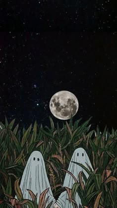 two white ghost standing in tall grass under a full moon