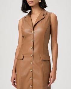 Crafted from our soft stretch faux leather in a warm golden brown shade, this sleeveless mini dress is fitted throughout the waist with princess seams and horn buttons. The Graciella Dress features a blazer-inspired collar and lapel, double flap pockets, and seams at the back. | Graciella Dress - Argan Oil Faux Leather | Size 00 Brown Leather Dress For Night Out, Fitted Faux Leather Brown Mini Dress, Fitted Brown Faux Leather Mini Dress, Brown Leather Mini Dress For Night Out, Faux Leather Mini Dress For Work, Brown Faux Leather Mini Dress For Spring, Elegant Brown Faux Leather Mini Dress, Sleeveless Faux Leather Mini Dress For Fall, Fitted Brown Faux Leather Dress