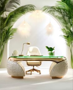 an office desk with palm trees in the background