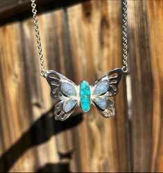 "🦋Butterfly Necklace🦋 Coober Pedy Opal doublet Kingman turquoise Sawed out sterling silver butterfly wing Sterling silver 18\" rolo chain including butterfly width Makers mark on the back  tiny flaw on upper right top of opal Originally $370 marked down to $350 Opal is not compromised just imperfect , Opal came that way. Hard to see unless it's in certain angles I'll include a picture and circle where the imperfection is. Handmade with love ❤️" Turquoise Butterfly Sterling Silver Jewelry, Handmade Turquoise Butterfly Jewelry, Barbie Ring, Turquoise Butterfly, Coober Pedy, Butterfly Wing, Silver Butterfly, Kingman Turquoise, Butterfly Necklace