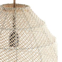 a light that is made out of rope and has a brown cord hanging from it