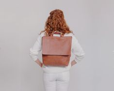 Vintage Satchel Backpack For On-the-go, Vintage Rectangular Leather Backpack For On-the-go, Vintage Backpack For On-the-go, Vintage Style On-the-go Backpack, Vintage Large Capacity Backpack For Everyday, Everyday Vintage Satchel Backpack, Vintage Everyday Backpack With Leather Backing, Vintage Everyday Backpack, Retro Large Capacity Backpack For Everyday