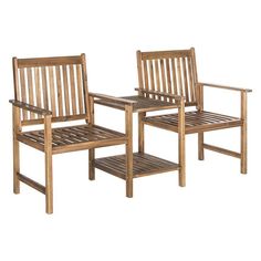 two wooden chairs sitting next to each other