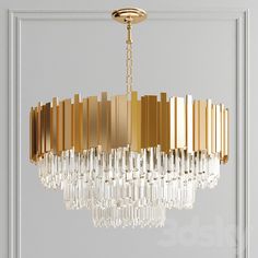 a gold chandelier hanging from the ceiling