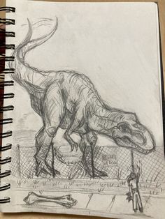 a drawing of a dinosaur on a piece of paper