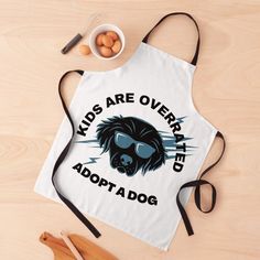 an apron that says kids are overrated adopt a dog