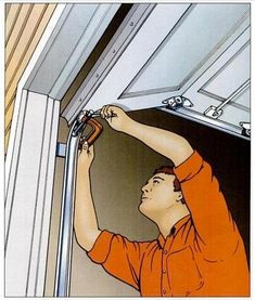 a man in an orange shirt working on a window