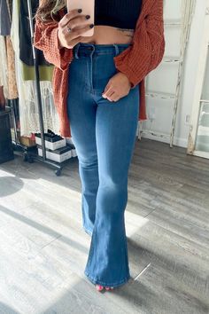 High-waisted flare jeans featuring a sweetheart-shaped back yoke, faux front pockets, 2 back patch pockets, and a zip-fly closure.- Rise: 10" Inseam: 32.5"- Model is 5'10" and wearing a size 3- True to size Made In: Imported Fabric Contents: 60% Cotton, 32% Modal, 7% T400, 1% Lycra Dark Wash Flare Denim Jeans, High Rise Denim Flares For Fall, Dark Wash Denim Flare Jeans, Fall Dark Wash Straight Leg Flares, Mid-rise Denim Blue Flares For Fall, Mid-rise Medium Wash Flares For Fall, Trendy Medium Wash Flares For Fall, Trendy Medium Wash Fall Flares, Trendy Fall Flares In Medium Wash