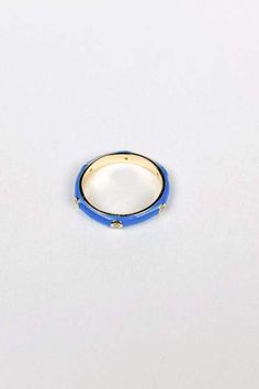 Fall in love with the Arlo Diamond Blue Enamel Ring.  The stunning 14k Gold is coated with a vibrant blue that will that an extra pop of color to any outfit.  Pair with contrasting bright colors for a fun lively look. Materials & Care:  14k Gold over 925 Sterling Silver Hypoallergenic and Water Resistant Use a soft microfiber or jewelry cloth to clean Store separate from other jewelry to avoid scratching Avoid direct contact with lotions, perfumes, chemicals, etc. Enamel Ring, Vibrant Blue, Bright Colors, Fall In Love, Chemicals, Light Colors, Color Pop, In Love, Gemstone Rings