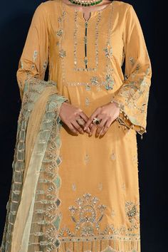 Dusty Yellow Embellished Pakistani Salwar Kameez Dupatta is artfully enriched with contrasted embroidery, hand adda embellishments, crystal like buttons. Dusty Yellow, Embroidery Suits Punjabi, Suits Punjabi, Pakistani Salwar, Pakistani Salwar Kameez, Embroidery Hand, Embroidery Neck Designs, Indian Suits, Embroidery Suits