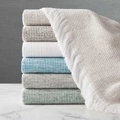 a stack of towels folded on top of each other