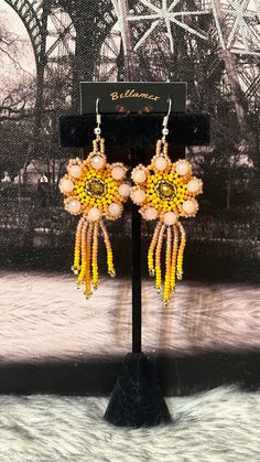 Beautiful handmade earrings made by Mexican artisans. Artisan Beaded Flower Drop Earrings, Artisan Beaded Drop Flower Earrings, Artisan Handmade Adjustable Beaded Earrings, Bohemian Handmade Drop Clip-on Earrings, Handmade Bohemian Drop Clip-on Earrings, Handmade Bohemian Dangle Clip-on Earrings, Artisan Adjustable Drop Earrings, Adjustable Artisan Drop Earrings, Handmade Flower Chandelier Earrings Gift