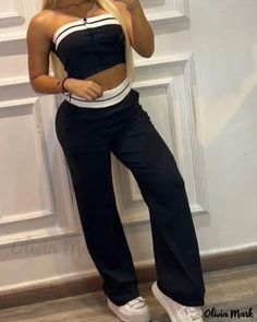 Olivia Mark - Contemporary Contrast Paneled Bandeau Top and Pants Ensemble Casual Fitted Two-piece Pants Set, Casual Two-piece High Waist Set, Casual Fitted Sleeveless Pant Set, Casual High Waist Two-piece Set, Casual High-waisted Two-piece Set, Black Fitted Pant Set For Spring, Casual High Waist Sets For Night Out, Fitted Casual Two-piece Bottoms Set, Casual High-waisted Outfit Sets For Night Out