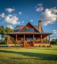 a small cabin style house with a porch and wraparound porch