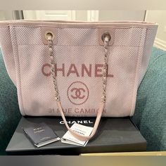 Chanel Pink Canvas Tote Bag Comes With Authentication Card, Dust Bag And Chanel Box. Never Used, In Excellent Condition 16” L 10” H 4” W Large Luxury Bags With Removable Pouch, Large Luxury Shopping Bag, Luxury Large Shoulder Bag With Removable Pouch, Large Luxury Beige Bag, Luxury Large Beige Bag, Luxury Large Capacity Pink Shoulder Bag, Elegant Large Bags With Large Capacity, Large Elegant Beige Shoulder Bag, Elegant Large Shoulder Bag For Shopping