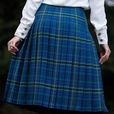 "Medium Weight Pleated Ladies' Kilted Skirt The Fiona Skirt is pleated all the way around for style and comfort. Don't let the boys have all the fun! Our medium-weight Fiona kilted skirt is our solution to a woman's kilt. Whether you're matching your date or flying solo like the strong Celtic lady you are, this kilted skirt will give you an excuse to wear tartan! Choose from several tartans to match your family's ancestral tartan and your personal style. It is available in approximately 18-28″ i Green Fitted Skirt With Pleated Hem, Fitted Green Skirt With Pleated Hem, Green Accordion Pleats Skirt, Fitted Blue Bottoms With Accordion Pleats, Fitted Green Accordion Pleated Skirt, Casual Blue Skirt With Accordion Pleats, Blue Relaxed Pleated Skirt With Accordion Pleats, Blue Relaxed Fit Accordion Pleated Skirt, Blue Relaxed Accordion Pleated Skirt