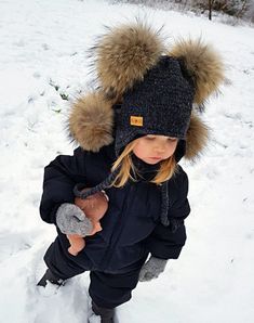 Cute and warm Merino wool winter hat for your little ones! Knitted pom pom hat. All our knitted hats are with 100% cotton lining so it's perfect for winter. Wind resistant and the head is not sweating. Because of the lining hats don't stretch and keep its shape. Material: 100% Merino wool Lining: 100% cotton Pom pom: Natural fur Hand knit Fur pom color can be a bit different because fur is natural. Sizes available: 0-3 months old (38/40 cm.) 3-6 months old (42/44 cm.) 6-12 months old (46/48 cm.) Kids Winter Hat, Weather Wind, Spring Hat, Knit Pom Pom Hat, Fur Pom Pom Hat, Hat For Kids, Kids Winter Hats, Flap Hat, Ear Flap Hats