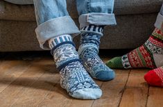 As the temperature drops you can count on our Snowdrop Crew Socks to keep your spirits up & your feet warm. Featuring delicate snowflake designs - perfect for those apres-ski powder days or those cozy nights in. Colors in this sock: Navy, White, Powder Blue, and Steel Blue. Scandinavian Style Winter Socks With Fair Isle Pattern, Comfortable Winter Socks With Fair Isle Pattern, Cozy Winter Socks With Fair Isle Pattern, Comfortable Fair Isle Pattern Winter Socks, Nordic Warm Winter Socks, Comfortable Blue Winter Socks, Comfortable Blue Socks For Winter, Solmate Socks, Holiday Socks