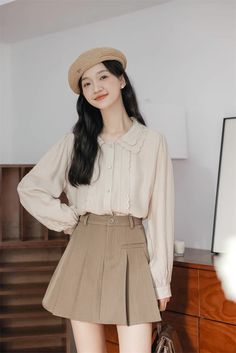 Button up shirt with a double scalloped collar, scallop trim placket details and long blouson sleeves. S: 15" across shoulders, 38.5" chest, 24.5" lengthM: 15.5" across shoulders, 40" chest, 24.5" lengthL: 16" across shoulders, 41.5" chest, 25" lengthXL: 16.5" across shoulders, 43" chest, 25" length Solid Long Sleeve Blouse With Placket, Casual Blouse With Cute Collar For Fall, Casual Blouse With Peter Pan Collar, Casual Blouse With Peter Pan Collar For Daywear, Spring Workwear Tops With Cute Collar, Casual Peter Pan Collar Blouse For Daywear, Spring Office Wear Blouse With Placket, Spring Office Lady Blouse With Collar, Spring Collared Office Blouse