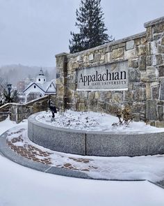 the entrance to appalachan university covered in snow