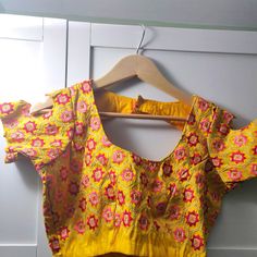 Readymade Blouse For Saree. Yellow Colour With Multi Thread Embroidery On It. Size -36 ,Can Be Extended Upto 42 Bundle Up For More Discounts Don't Forget To Check My Other Closet Items . Happy Shopping Yellow Blouse Piece With Dori Work, Fitted Multicolor Tops With Resham Embroidery, Fitted Multicolor Tops With Dori Work, Spring Bollywood Blouse Piece With Floral Print, Fitted Yellow Blouse With Dori Work, Spring Fitted Choli With Resham Embroidery, Summer Tops With Dori Work, Festive Yellow Embroidered Blouse, Fitted Blouse With Multicolor Embroidery And Dori Work