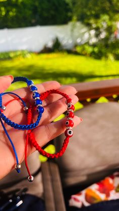 Handmade Red Symbolic Beaded Bracelets, Red Symbolic Handmade Bracelets, Handmade Blue Evil Eye Bracelet For Friendship, Handmade Red Braided Friendship Bracelets, Blue Braided Bracelets With Colorful Beads For Gift, Spiritual Handmade Blue Braided Bracelets, Handmade Red Evil Eye Bracelet As A Gift, Handmade Red Evil Eye Bracelet For Good Luck, Handmade Red Evil Eye Bracelet For Gift