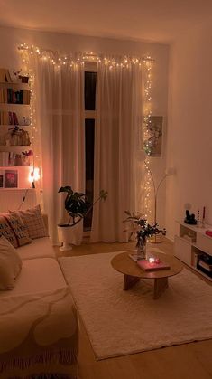 a living room filled with furniture and a flat screen tv