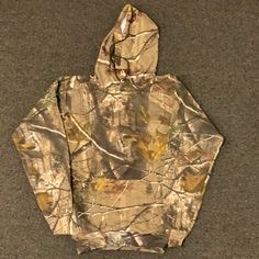 Hide Out In The Woods With This Sweet Camo Hoodie! Fall Camouflage Sweatshirt With Drawstring Hood, Camouflage Drawstring Hood Sweatshirt For Fall, Camouflage Sweatshirt With Drawstring Hood For Fall, Camouflage Fleece Hoodie For Fall, Camouflage Hoodie Sweatshirt With Adjustable Hood, Fall Camouflage Hooded Sweatshirt, Hooded Camouflage Sweatshirt For Fall, Fall Camouflage Sweatshirt With Adjustable Hood, Camouflage Sweatshirt With Adjustable Hood For Fall