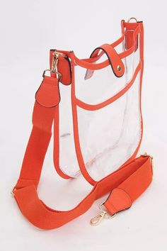 Let your VOLS spirit soar with our Game Day Mini Clear Crossbody! Silver hardware, detachable shoulder strap, and convenient magnetic snap closure will make you stand out from the crowd. Plus, you can add our Keychain holder as an accessory so you can keep your keys close at hand. Go VOLS! Details: Clear Cross Body Bag with Orange Trim Detachable Shoulder Strap 9.5" W x 9.5" H x 2.8" D Crossbody Shoulder Bag With Clear Strap, Clear Strap Crossbody Shoulder Bag, Trendy On-the-go Bag With Snap Closure, Daily Use Crossbody Bag With Clear Strap, Everyday Crossbody Shoulder Bag With Clear Strap, Everyday Satchel With Clear Crossbody Strap, Everyday Satchel With Clear Strap And Crossbody Shape, Everyday Shoulder Bag With Clear Strap, Travel Crossbody Satchel With Clear Strap